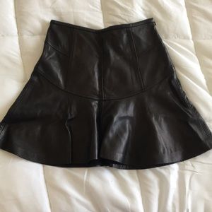 Black leather mini skirt
